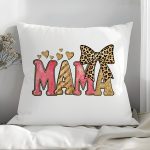 Chic MAMA pillow with pink and gold glitter text and leopard bow.