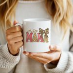 Bold MAMA mug with glitter text and hearts.