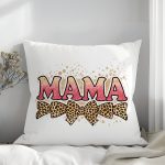 Bold MAMA pillow with pink glitter and splatter background.