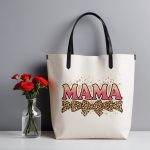 Trendy MAMA tote bag with glitter and leopard accents.