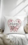 Delicate Mama pillow with soft hearts and bow.