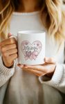 Delicate Mama mug with soft hearts and bow.